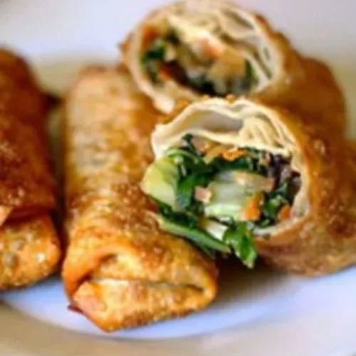 Crispy fried vegetable egg rolls cut open at Fusion Express chinatown, Chinese Restaurant in East Hampton